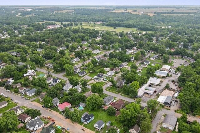 704 N Jefferson St, Mexico, MO 65265 - aerial view of property and surrounding area featuring nearby suburban area