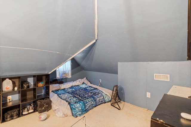 704 N Jefferson St, Mexico, MO 65265 - bedroom featuring vaulted ceiling and carpet floors