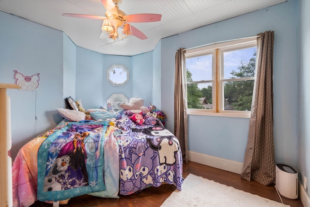 704 N Jefferson St, Mexico, MO 65265 - bedroom with wood finished floors and a ceiling fan