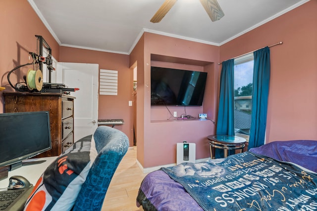704 N Jefferson St, Mexico, MO 65265 - bedroom with wood finished floors, crown molding, and ceiling fan