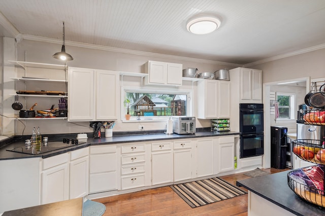 704 N Jefferson St, Mexico, MO 65265 - kitchen with dark countertops, white cabinetry, open shelves, and ornamental molding