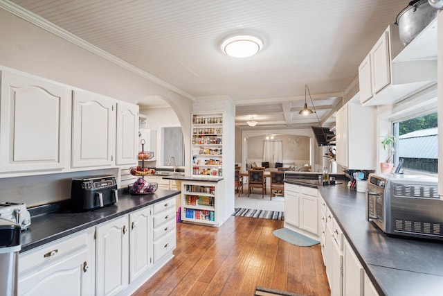 704 N Jefferson St, Mexico, MO 65265 - kitchen with dark countertops, ornamental molding, white cabinetry, and open shelves