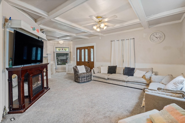 704 N Jefferson St, Mexico, MO 65265 - carpeted living room with coffered ceiling, beam ceiling, wainscoting, and a ceiling fan
