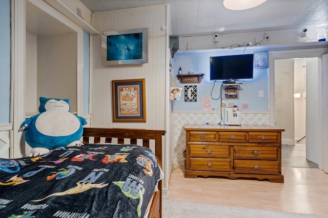 704 N Jefferson St, Mexico, MO 65265 - bedroom with light wood-style floors