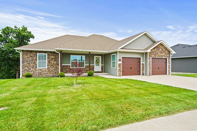 4969 W Red Tail Dr, Ashland, MO 65010 - craftsman inspired home with an attached garage, a front yard, concrete driveway, a shingled roof, and stone siding