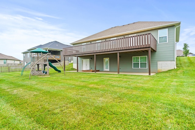 4969 W Red Tail Dr, Ashland, MO 65010 - back of property featuring a patio area, a playground, and a wooden deck