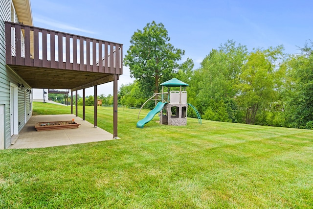 4969 W Red Tail Dr, Ashland, MO 65010 - view of grassy yard featuring a playground and a patio