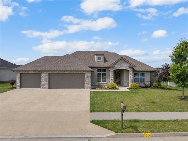 5204 Newbury Way, Columbia, MO 65203 - view of front of home with stone siding, an attached garage, a front yard, driveway, and roof with shingles