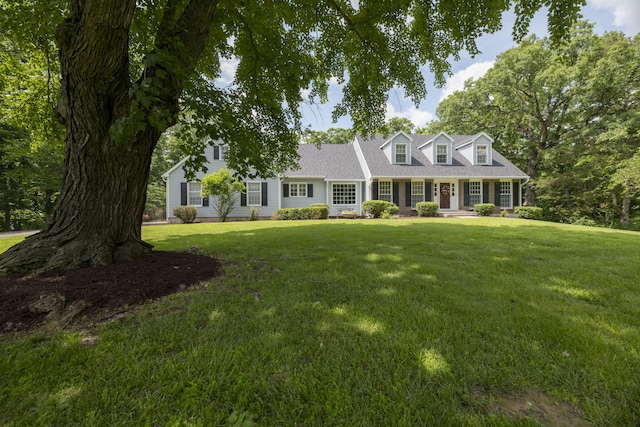 5111 S Brock Rodgers Rd, Columbia, MO 65201 - new england style home featuring a front lawn and a porch