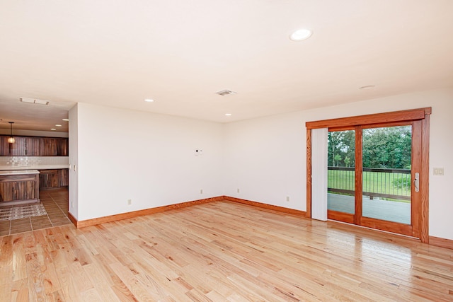 902 S Cedar Grove Blvd, Columbia, MO 65201 - unfurnished room with light wood finished floors and recessed lighting