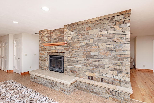 902 S Cedar Grove Blvd, Columbia, MO 65201 - unfurnished living room with a fireplace, recessed lighting, and tile patterned flooring