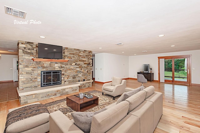 902 S Cedar Grove Blvd, Columbia, MO 65201 - living area with wood finished floors, a fireplace, and recessed lighting