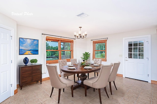902 S Cedar Grove Blvd, Columbia, MO 65201 - dining space with a chandelier and baseboards