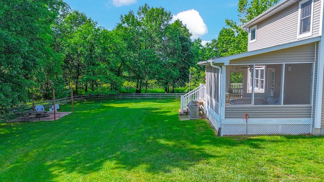 5200 N Locust Grove Church Rd, Columbia, MO 65202 - view of yard featuring a sunroom and view of scattered trees
