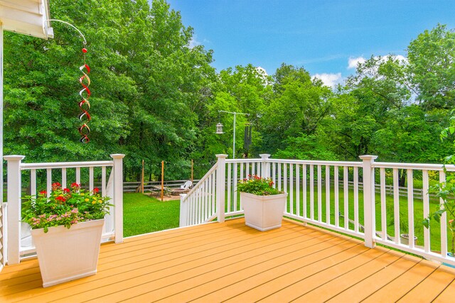 5200 N Locust Grove Church Rd, Columbia, MO 65202 - deck featuring a lawn and view of wooded area