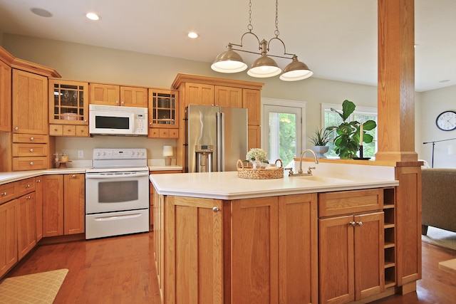 5200 N Locust Grove Church Rd, Columbia, MO 65202 - kitchen with white appliances, light countertops, dark wood-type flooring, glass insert cabinets, and recessed lighting