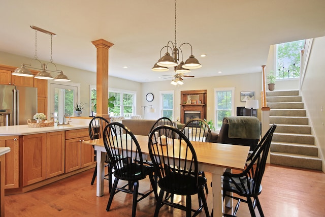 5200 N Locust Grove Church Rd, Columbia, MO 65202 - dining area with light wood-style floors, plenty of natural light, stairway, and recessed lighting