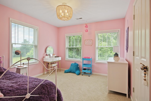 5200 N Locust Grove Church Rd, Columbia, MO 65202 - bedroom featuring light carpet and a chandelier