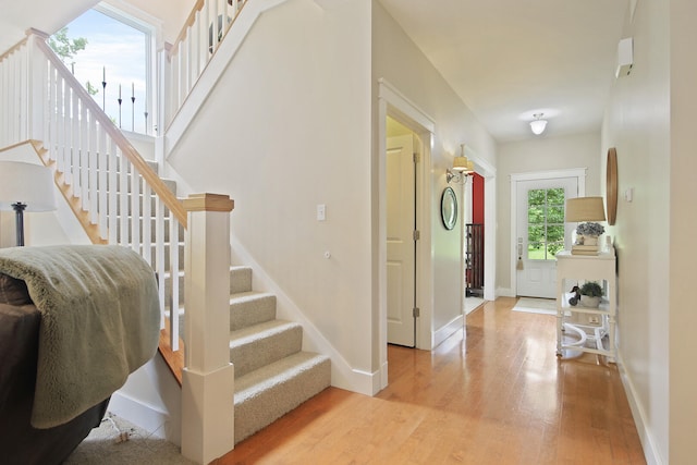 5200 N Locust Grove Church Rd, Columbia, MO 65202 - entrance foyer with light wood-style flooring and stairway