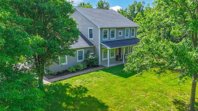 5200 N Locust Grove Church Rd, Columbia, MO 65202 - view of front of home with a front yard, a shingled roof, and covered porch