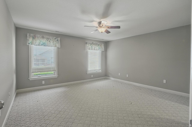 3904 Ivanhoe Blvd, Columbia, MO 65203 - unfurnished room with ceiling fan, healthy amount of natural light, and carpet floors