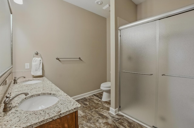 3904 Ivanhoe Blvd, Columbia, MO 65203 - bathroom with double vanity and a stall shower