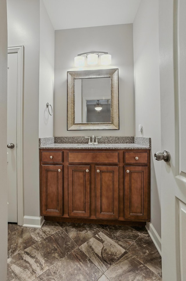 3904 Ivanhoe Blvd, Columbia, MO 65203 - bathroom featuring vanity and baseboards