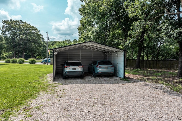 3674 State Road Aa, Holts Summit, MO 65043 - view of vehicle parking with a carport and gravel driveway