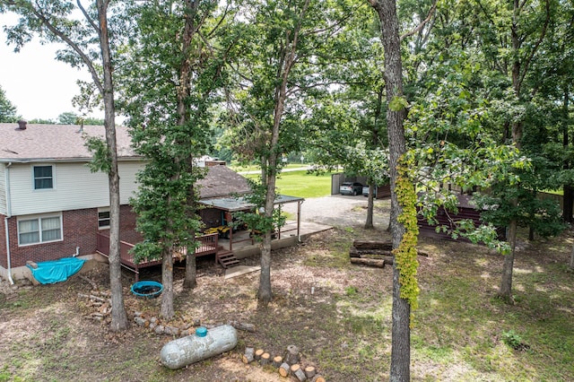 3674 State Road Aa, Holts Summit, MO 65043 - view of yard featuring a deck and driveway