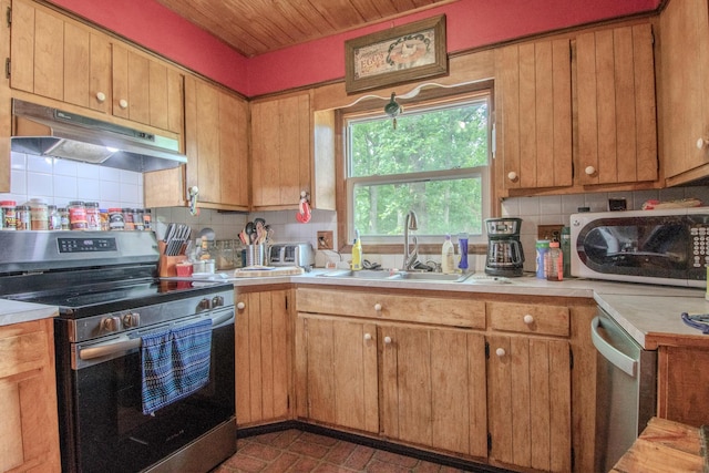 3674 State Road Aa, Holts Summit, MO 65043 - kitchen with appliances with stainless steel finishes, under cabinet range hood, light countertops, backsplash, and wooden ceiling