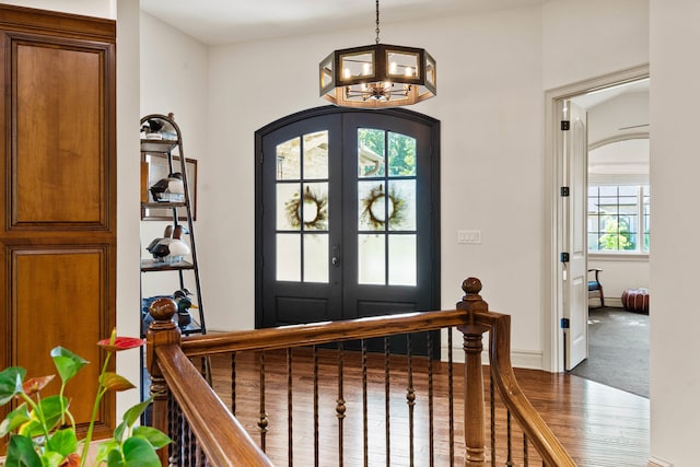5809 Morning Star Ct, Columbia, MO 65203 - foyer entrance with a chandelier, french doors, and wood finished floors