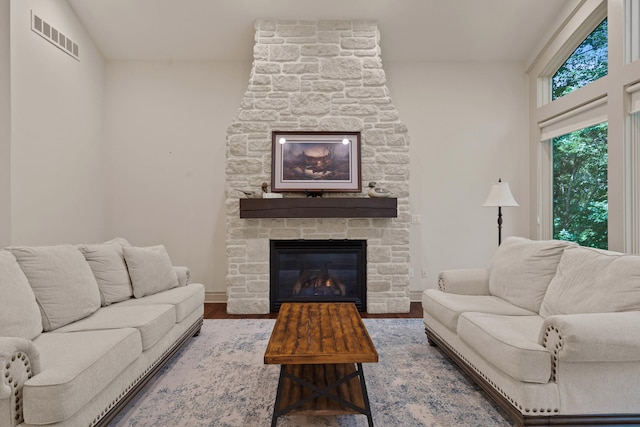 5809 Morning Star Ct, Columbia, MO 65203 - living area with a stone fireplace and wood finished floors