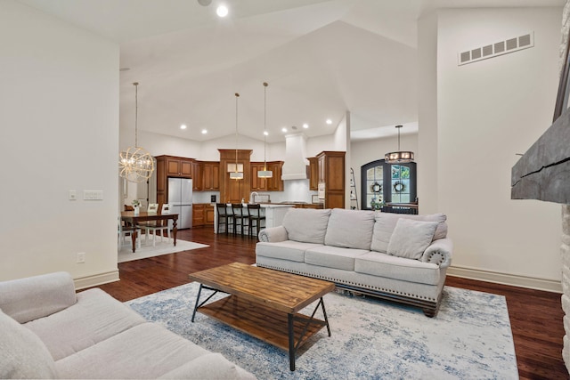 5809 Morning Star Ct, Columbia, MO 65203 - living room featuring high vaulted ceiling, a chandelier, dark wood finished floors, and recessed lighting