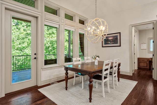 5809 Morning Star Ct, Columbia, MO 65203 - dining area featuring dark wood-type flooring and a chandelier