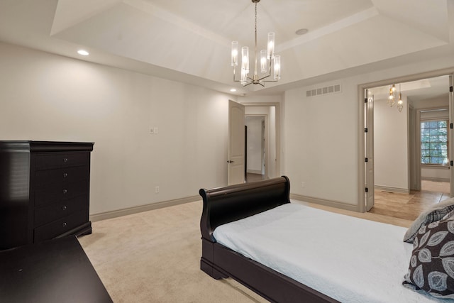 5809 Morning Star Ct, Columbia, MO 65203 - bedroom with a chandelier, a tray ceiling, and recessed lighting