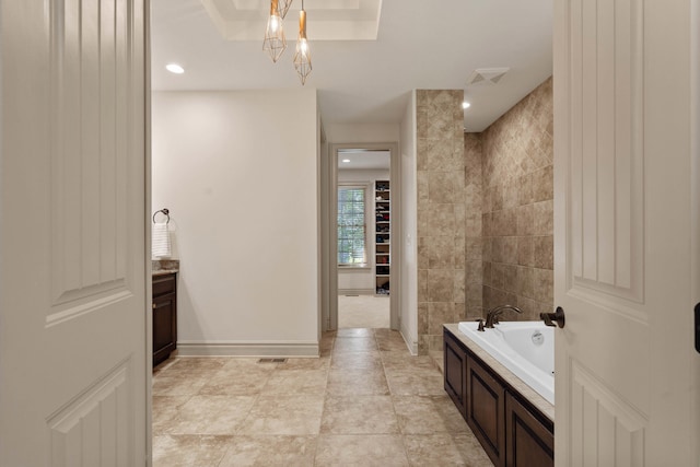 5809 Morning Star Ct, Columbia, MO 65203 - bathroom featuring a garden tub and vanity