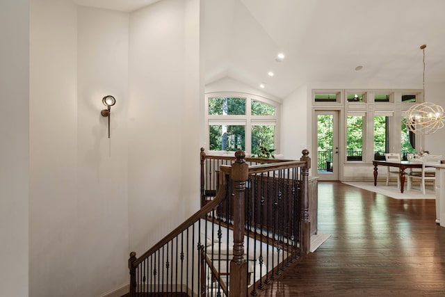 5809 Morning Star Ct, Columbia, MO 65203 - stairway featuring hardwood / wood-style floors, lofted ceiling, a chandelier, and recessed lighting