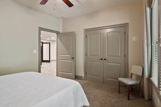 5809 Morning Star Ct, Columbia, MO 65203 - bedroom with a closet, light carpet, and a ceiling fan