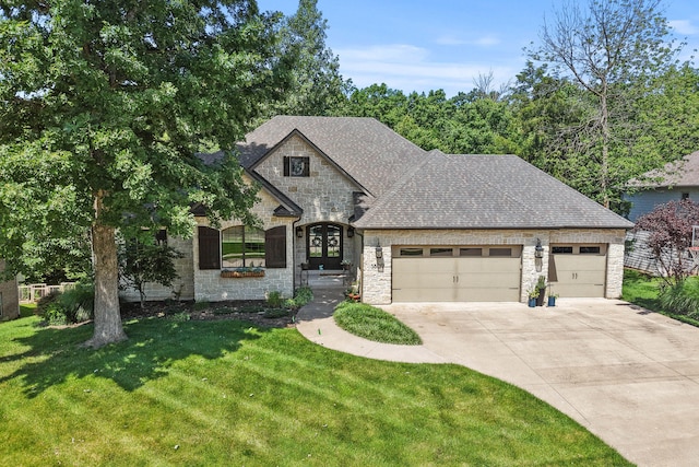 5809 Morning Star Ct, Columbia, MO 65203 - french country style house with stone siding, a garage, concrete driveway, a front yard, and a shingled roof