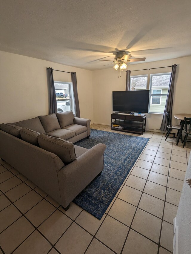 505 W Worley St, Columbia, MO 65203 - living room with light tile patterned flooring and a ceiling fan