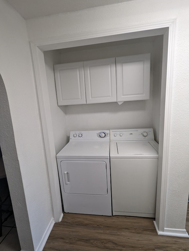 505 W Worley St, Columbia, MO 65203 - laundry area with washer and clothes dryer, dark wood-type flooring, and cabinet space