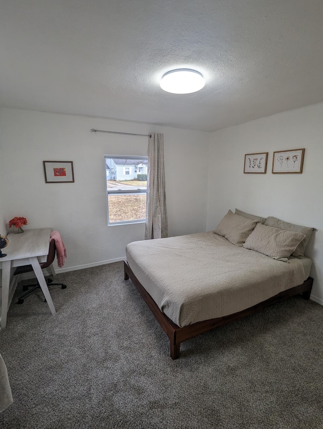 505 W Worley St, Columbia, MO 65203 - bedroom featuring a textured ceiling and carpet