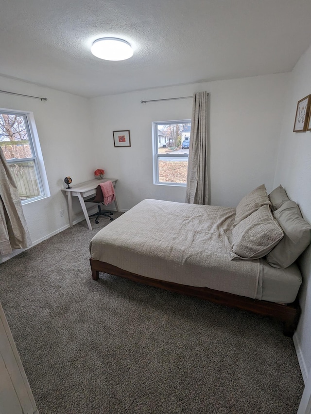 505 W Worley St, Columbia, MO 65203 - bedroom featuring carpet floors and a textured ceiling