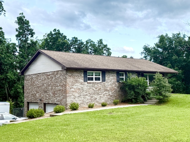 3900 E Christian School Rd, Hartsburg, MO 65039 - view of property exterior featuring brick siding, a garage, a lawn, and a shingled roof