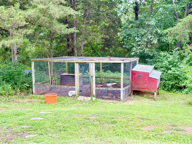 3900 E Christian School Rd, Hartsburg, MO 65039 - view of grassy yard with exterior structure and an outdoor structure