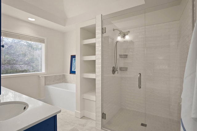 3109 Appalachian Dr, Columbia, MO 65203 - bathroom featuring vanity, a shower stall, a garden tub, and recessed lighting