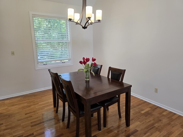 3109 Appalachian Dr, Columbia, MO 65203 - dining area featuring a chandelier and wood finished floors