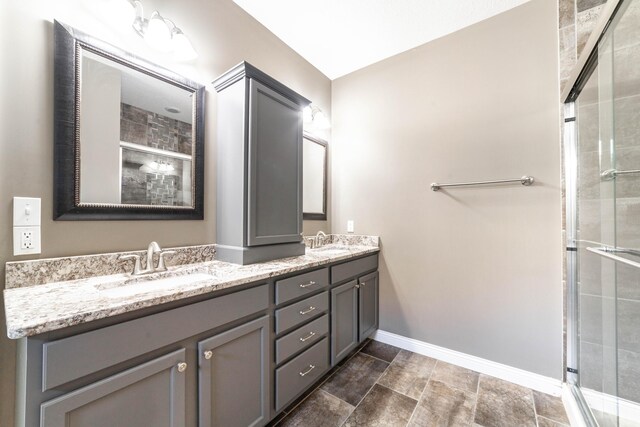 1915 Muirfield Dr, Columbia, MO 65203 - bathroom with a shower stall and double vanity