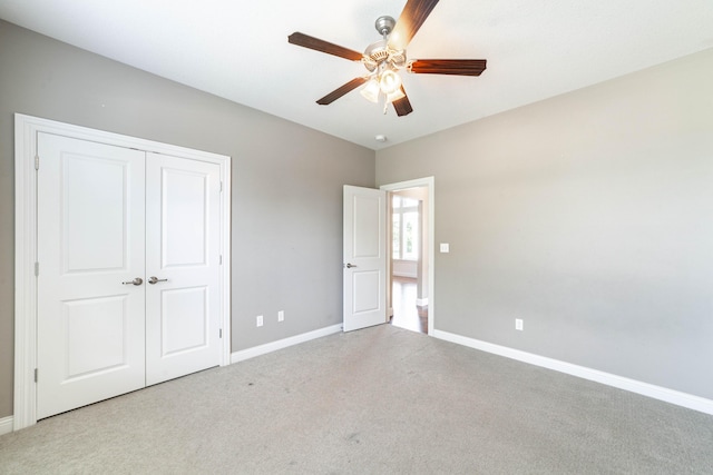1915 Muirfield Dr, Columbia, MO 65203 - unfurnished bedroom with carpet floors, a closet, and a ceiling fan