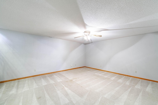 6002 E Molly Ln, Columbia, MO 65202 - empty room with ceiling fan, light carpet, and a textured ceiling